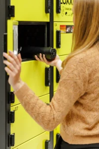LOXXER LOX12 charging locker – inserting battery charger into compartment